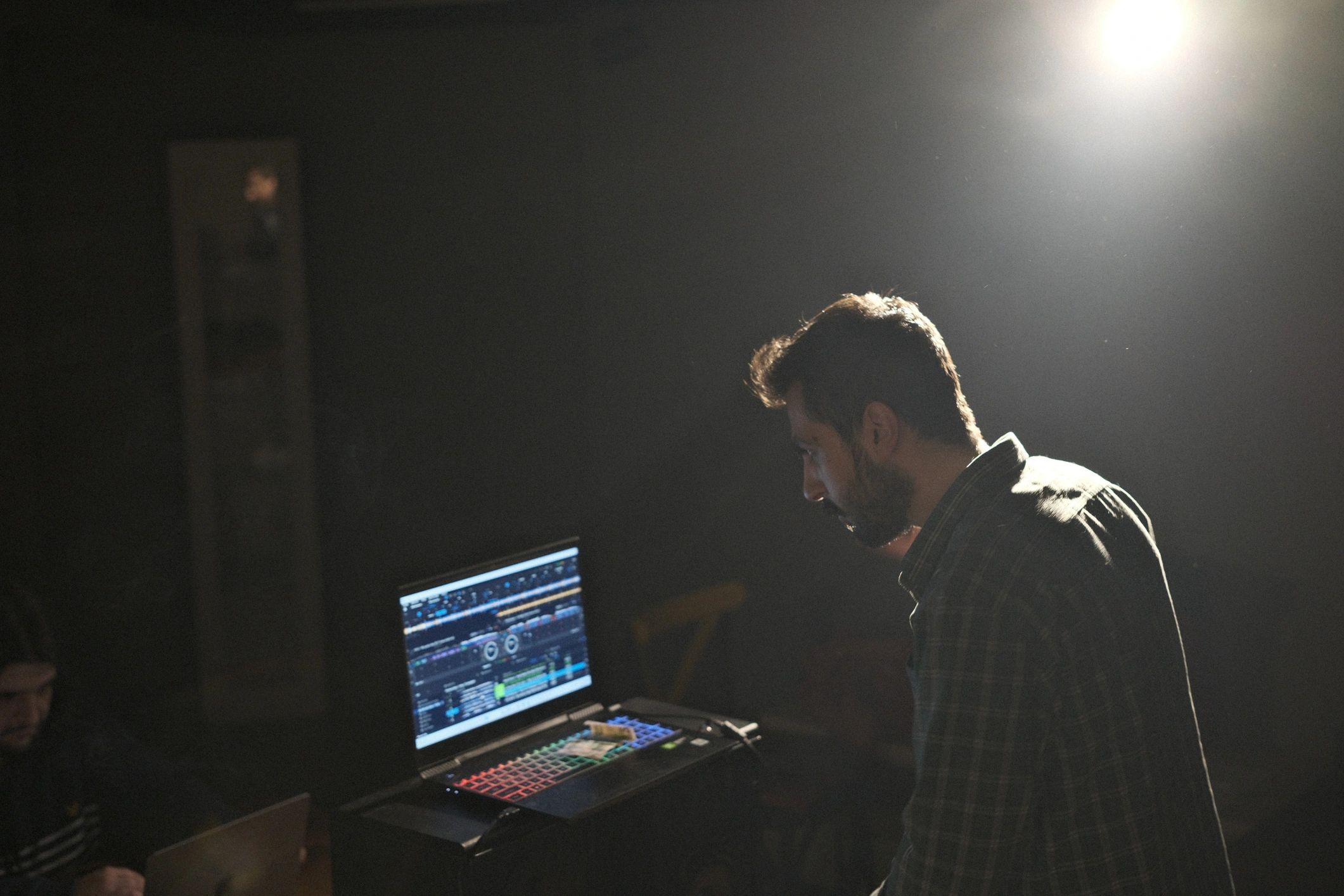 Music producer working in a recording studio