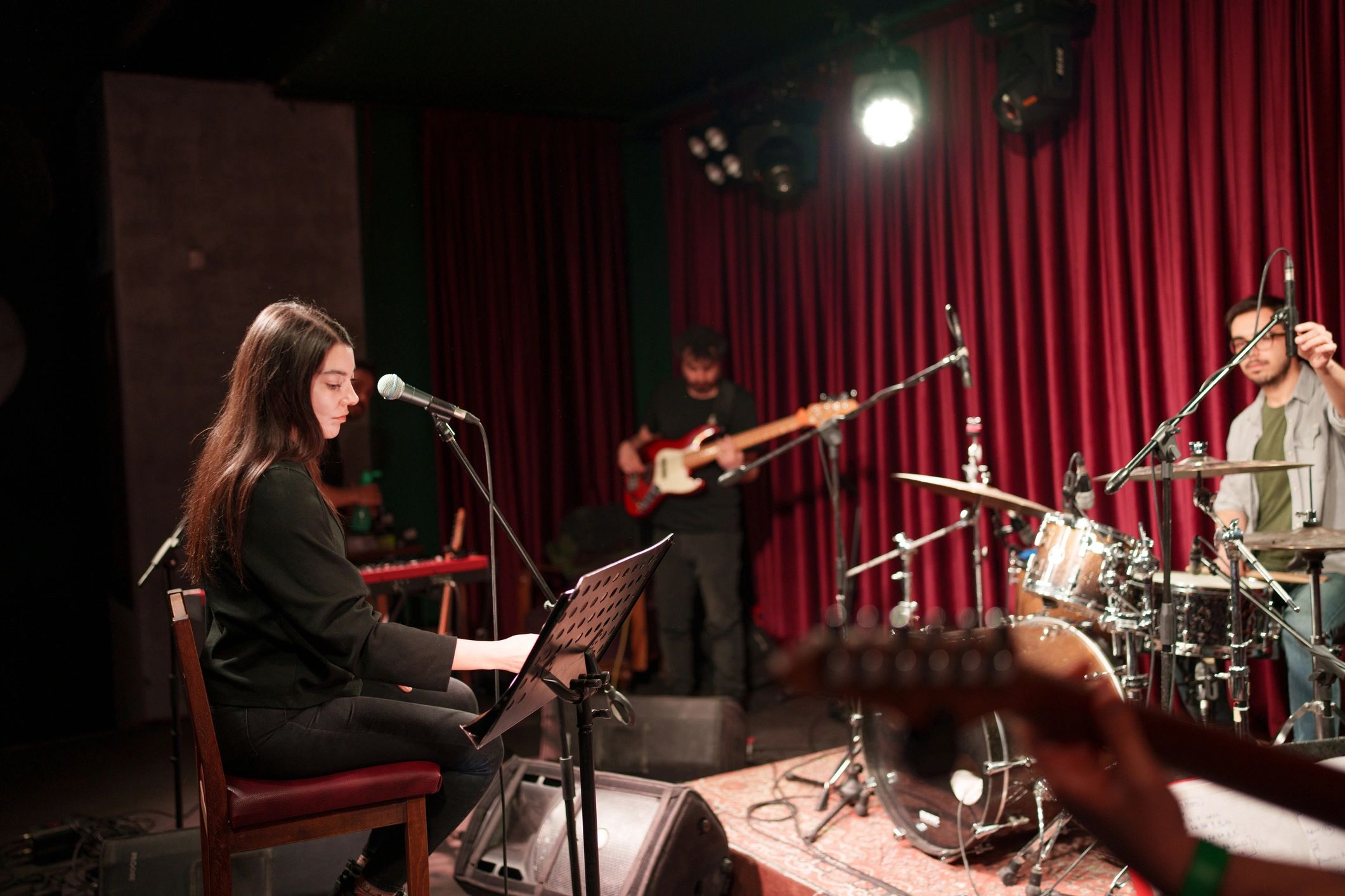 Band collaborating during a studio-style session